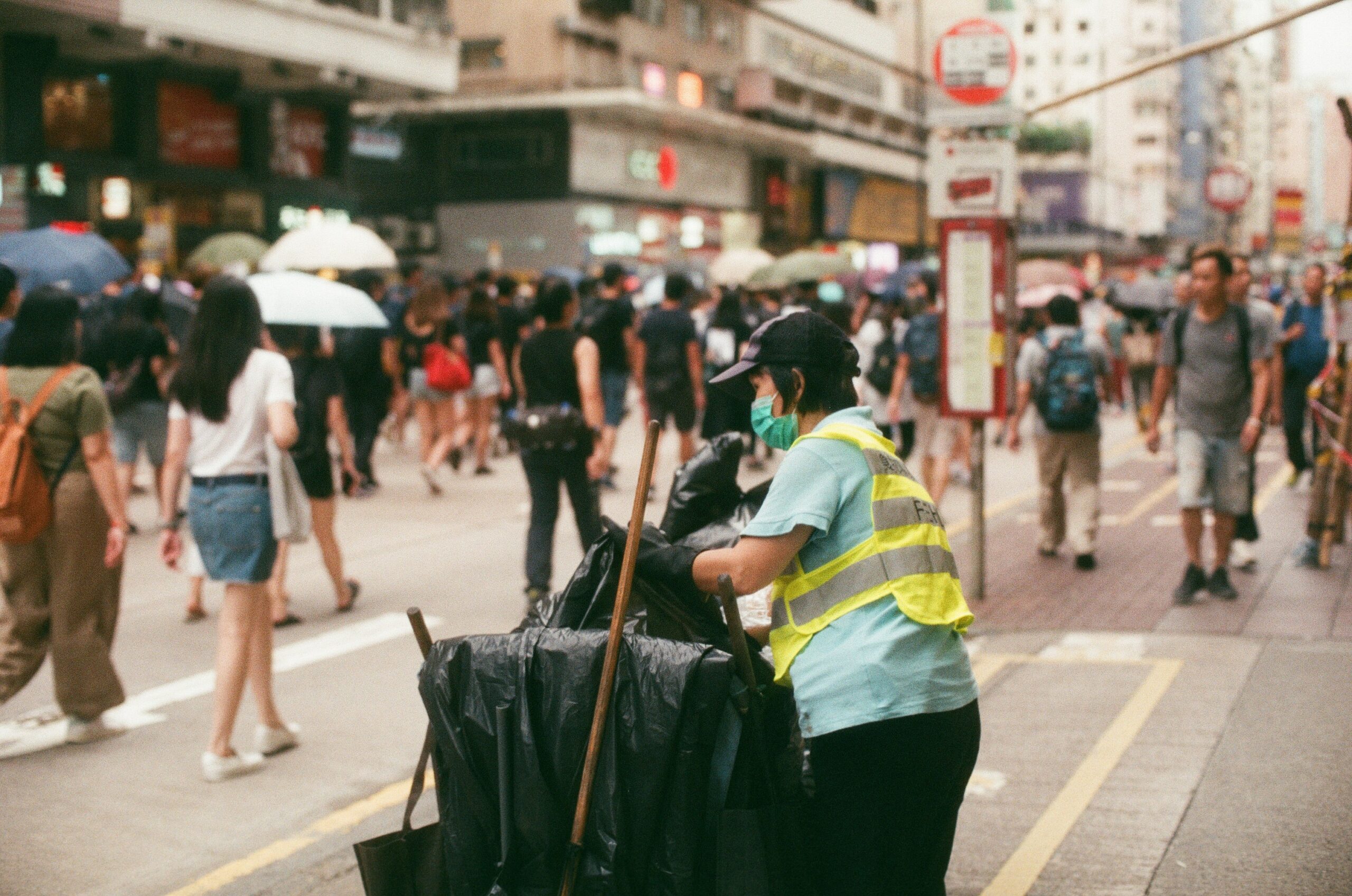 people walking along city streets