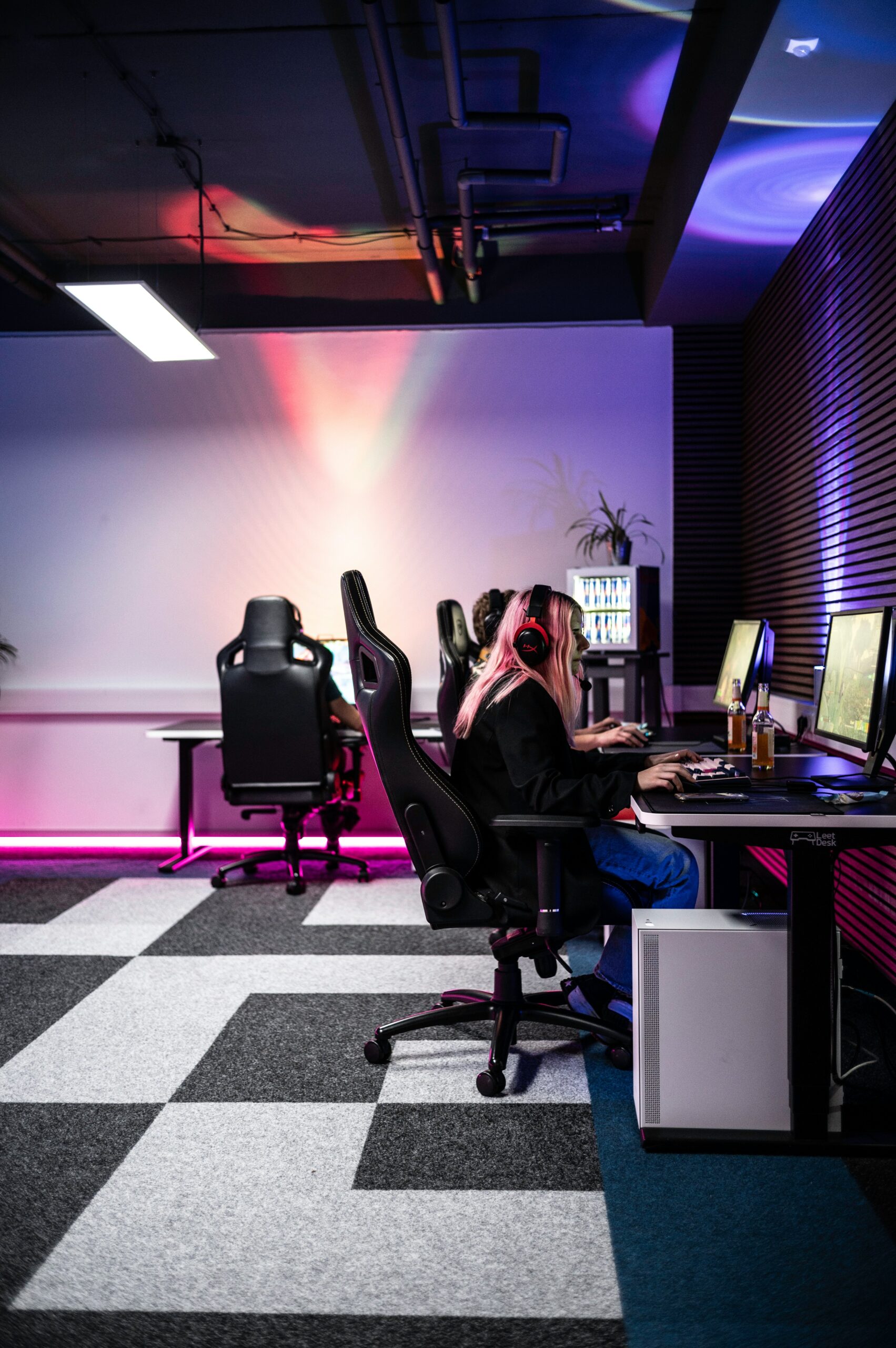 A woman sitting at a desk in an office